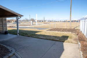 View of yard with a patio