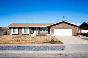 Ranch-style house with a garage