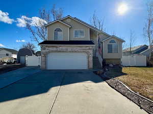 View of front of property featuring a garage