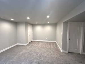 Basement featuring carpet floors