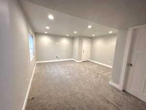 Basement featuring carpet floors