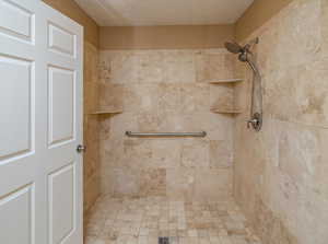 Bathroom with tiled shower