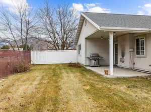 View of yard with a patio