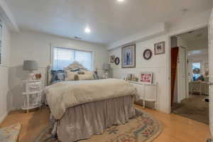 Bedroom with laminate floors