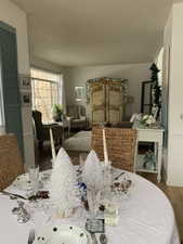 Dining space featuring hard wood floors.