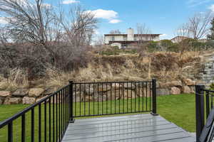 Wooden deck with a yard