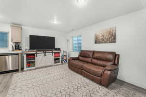 Living room featuring light hardwood / wood-style flooring