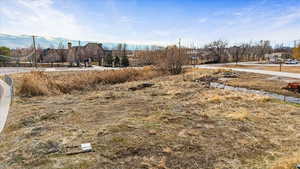 View of yard featuring a mountain view and a rural view