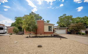 View of front of property featuring a garage