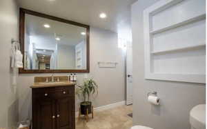 Bathroom with vanity and toilet