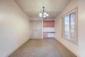 Second main floor bedroom, also used as an office. Lots of light and mountain views!