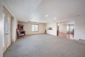 Enjoy this over sized family room with a very warm cozy corner fireplace!