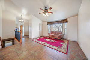 Breakfast nook  with lofted ceiling & fan. Directly in front of kitchen!