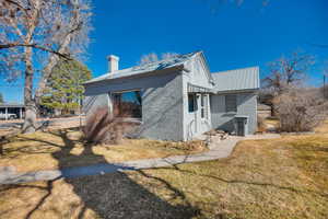 View of home's exterior featuring a yard