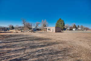 Exterior space featuring an outbuilding