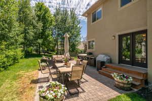 View of patio / terrace featuring french doors, grilling area, and outdoor lounge area