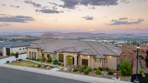 View of front of home featuring a mountain view