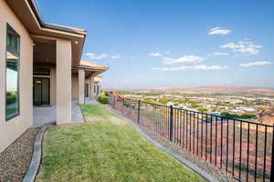 View of yard featuring a mountain view and a patio area