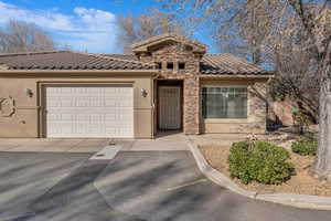 View of front of home with a garage