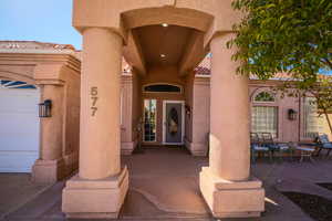 Entrance to property with a garage