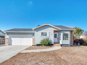 Ranch-style home with a garage