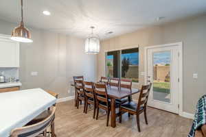 Dining space featuring light hardwood / wood-style floors