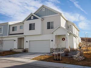 View of front of home featuring a garage