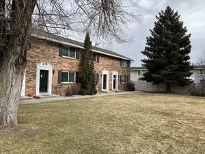 View of front facade with a front lawn