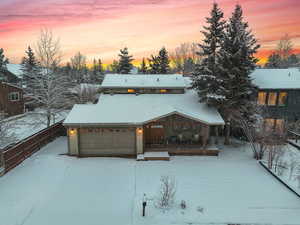 View of front of home with a garage