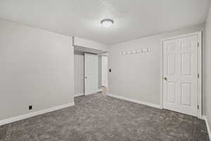 Storage room, exercise room or office with new carpet