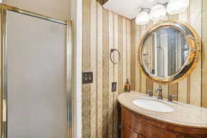 Main floor hall Bathroom with toilet, shower and vanity