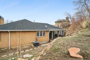 Rear view of property taken from upper level of yard, backs up to 15th hole of the Bountiful Ridge Golf Course