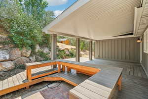 Trex deck featuring cutout for hot tub, movable seating around hot tub area, wired and ready for your hot tub!