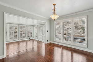 Dining area near attrium, hardwood floors