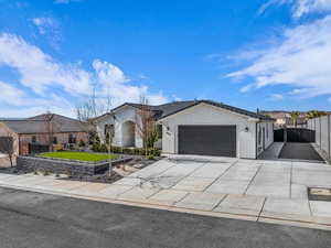 Single story home featuring a garage