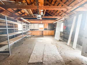 Misc room featuring lofted ceiling