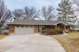 Ranch-style home with a garage