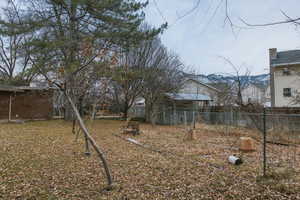 View of yard with a mountain view