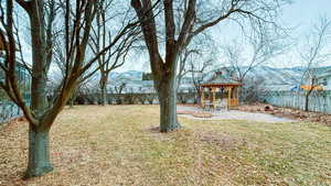 View of yard with a gazebo and a mountain view