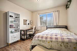 Bedroom featuring light hardwood / wood-style floors