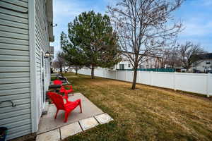 View of yard with a patio area