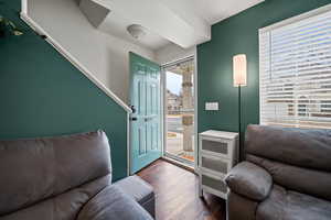 Foyer with dark wood-type flooring