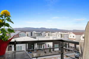 Balcony featuring a mountain view