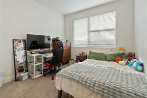 Bedroom featuring carpet flooring