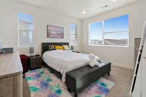 View of carpeted bedroom