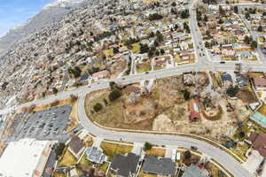 Birds eye view of property with a mountain view