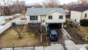 View of front of property featuring a garage