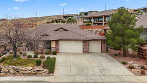 View of front of property featuring a garage