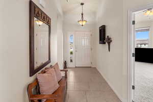 Entryway featuring light tile patterned floors