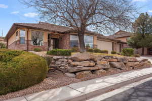 View of front of property with a garage